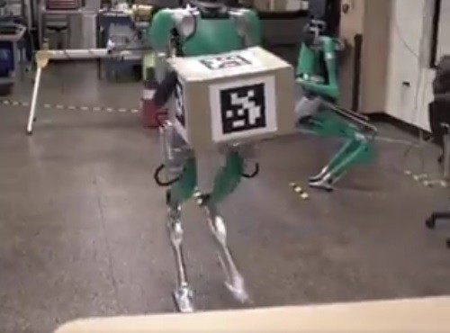 Digit Robot made by Agility Robotics and bought by Ford. Makes a firm grip with the Box using its two arms