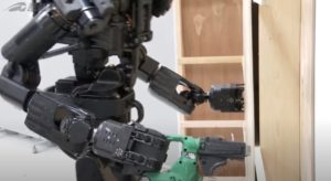 HRP-5P ROBOT - using hand drilling machine and screwing machine to fix wood boards on the walls