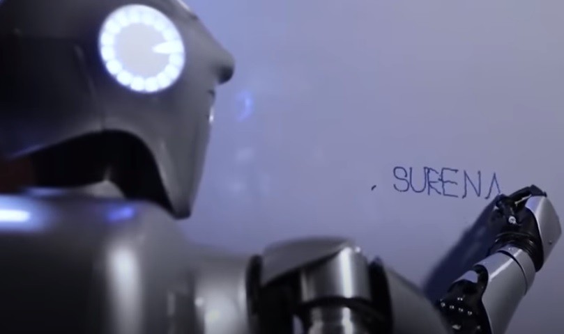SURENA IV - writing its name on the board with a marker