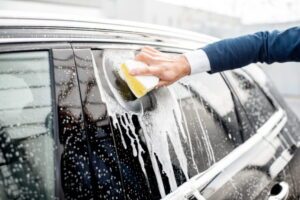 Can I wash my car after tint?